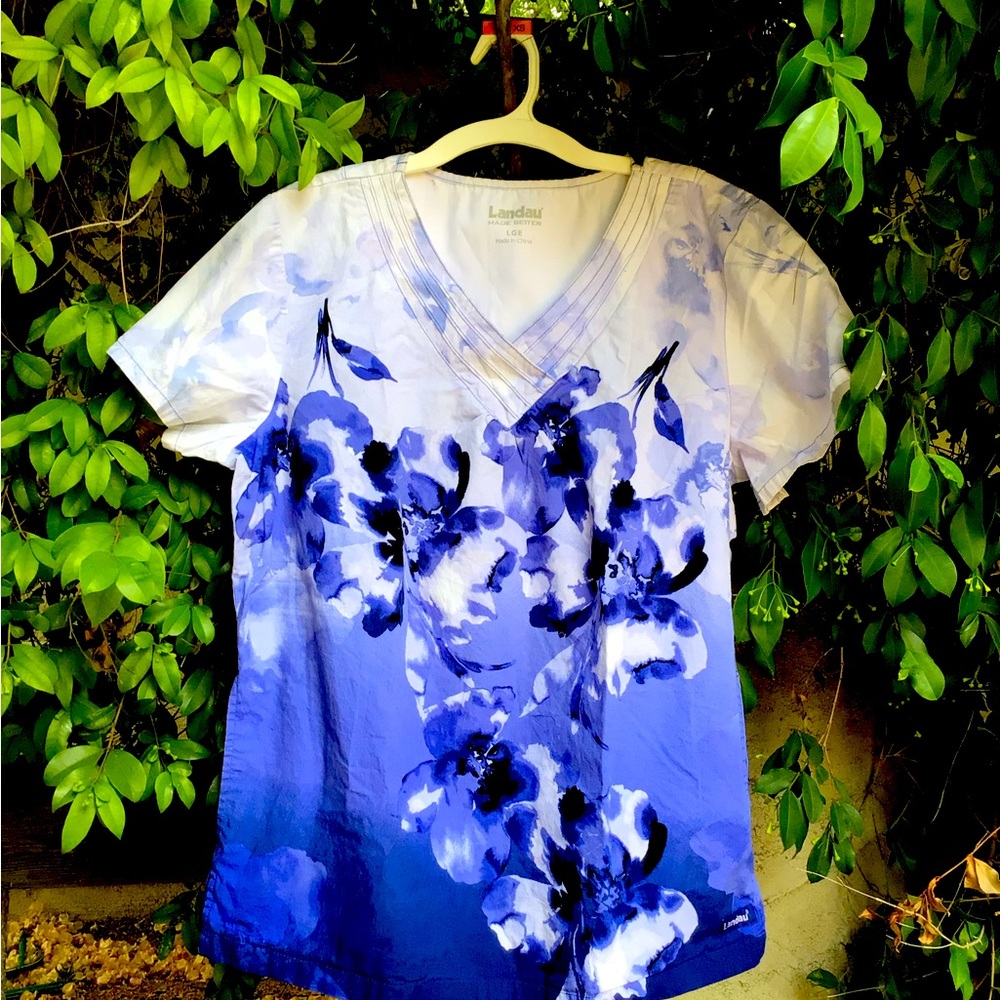 Nursing top size large but fits medium, like new no flaws